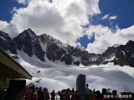 玉龙雪山和稻城哪个海拔高