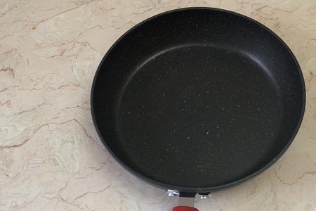 麦饭石和星星石炒锅哪个好
