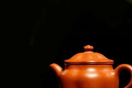 紫砂壶用茶叶煮会容易包浆吗