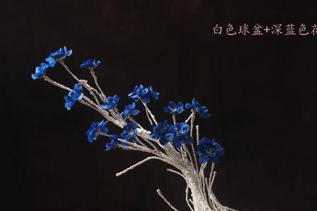 黑色玻璃茶几摆什么假花好看