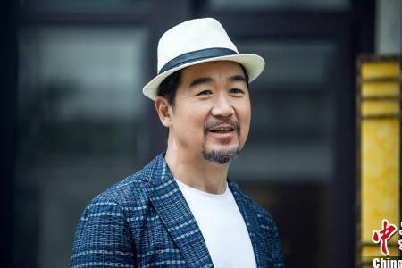 张译父亲是不是张国立
