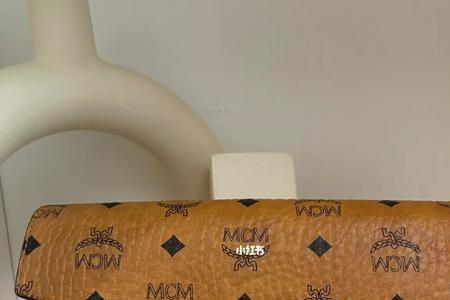 mcm中号链条包怎么缩短带子