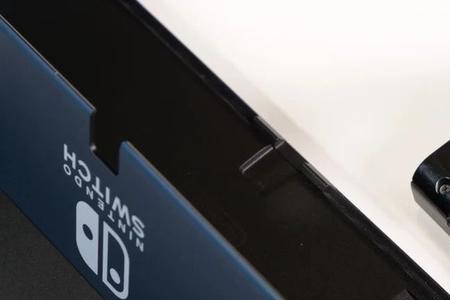 switch oled怎么插储存卡