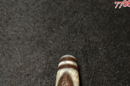 四线虎牙天珠的寓意