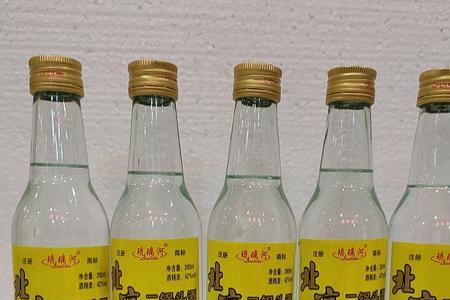 42度半斤白酒相当于53度多少