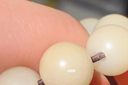 白玉菩提摔裂和开片区别