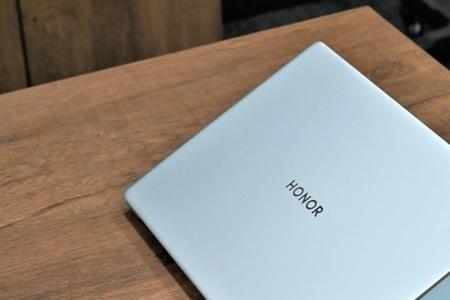 荣耀magicbook14怎么合并到一个磁盘