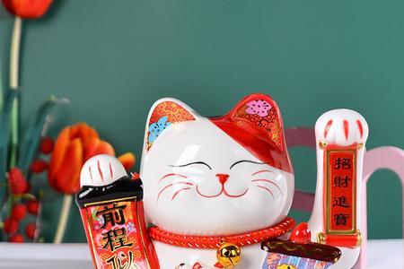 新买的招财猫总趴在缸底不动