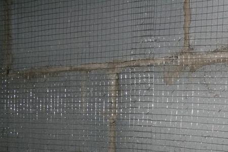 挂网用钢丝网还是纤维网