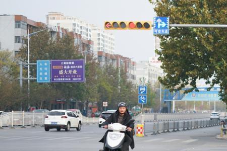 济南摩托车闯红灯会触发拍照吗