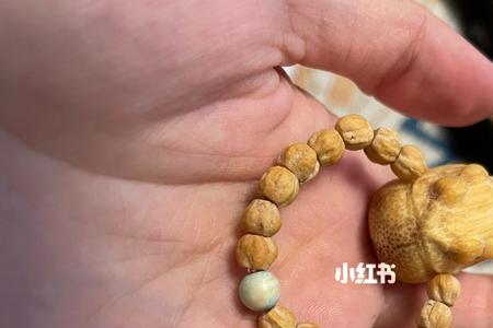 手捻小串有什么含义