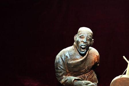 捏泥人的评语