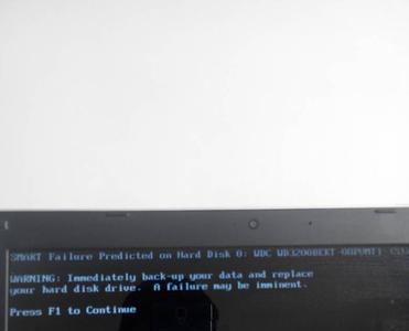 电脑自动重启提示press f2 to load default