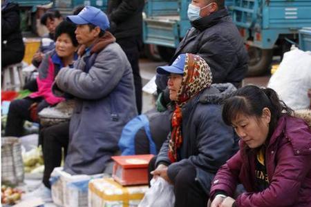 三伏天穿棉衣打一省会