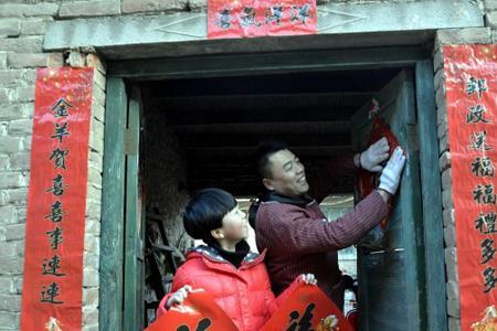 子母门怎么贴对联