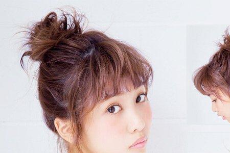 考试扎丸子头什么寓意