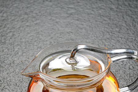 玻璃壶能放在炭炉上持续加热吗