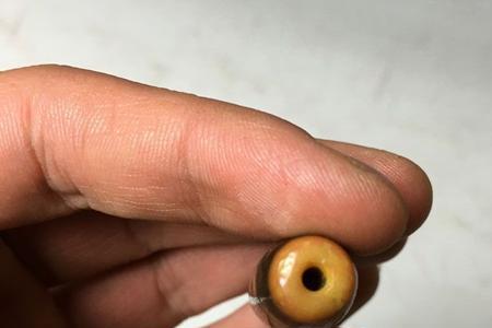 天珠的风化纹如何做旧