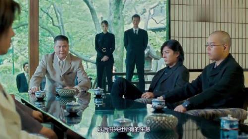 古惑仔开会墙上的照片是什么人