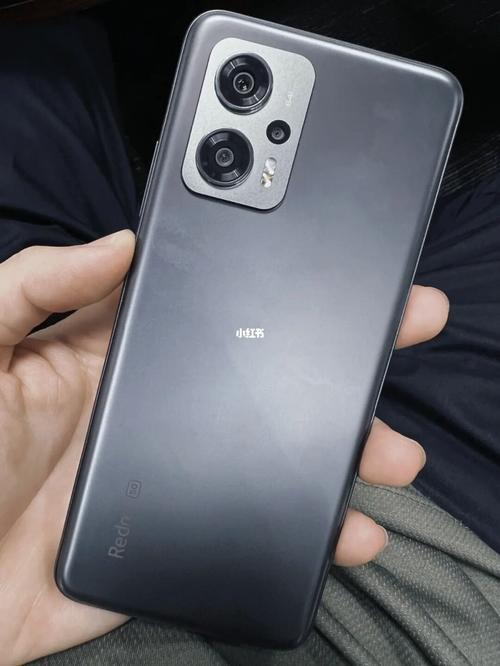 红米note11tpro充电口旁边的小孔