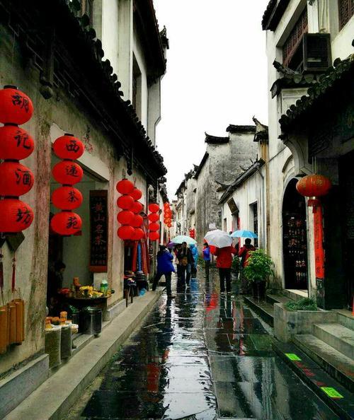 长安等雪落江南等雨停什么意思