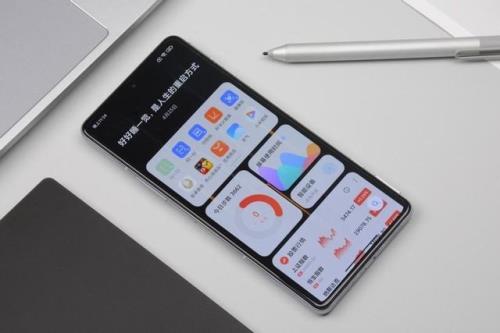 红米k40为什么一碰电源键就锁屏