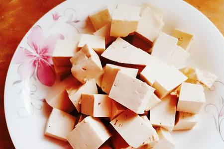 为什么买豆腐要添上一小块