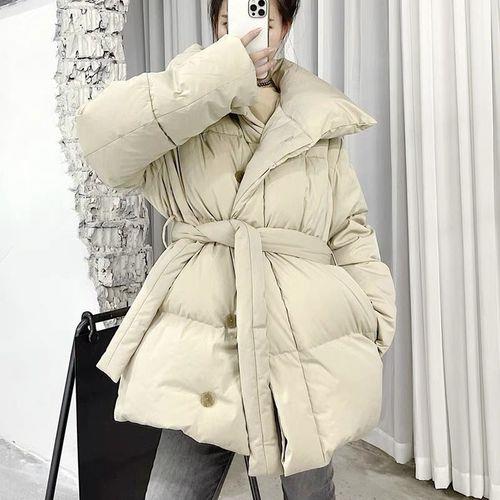 新买的羽绒服怎么蓬松