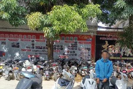 偷两万的摩托要判多久