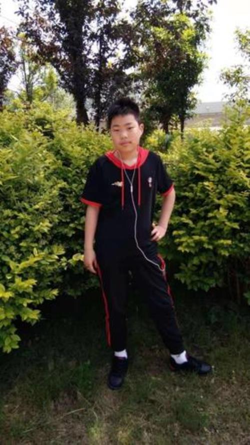 13周岁男孩一年会长多少厘米