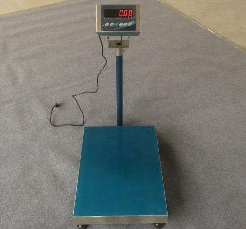 新光电子秤500克变490克怎么调