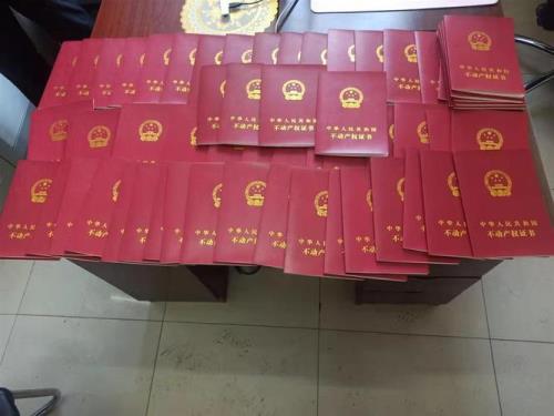 70平方房产证2年过户费怎么算