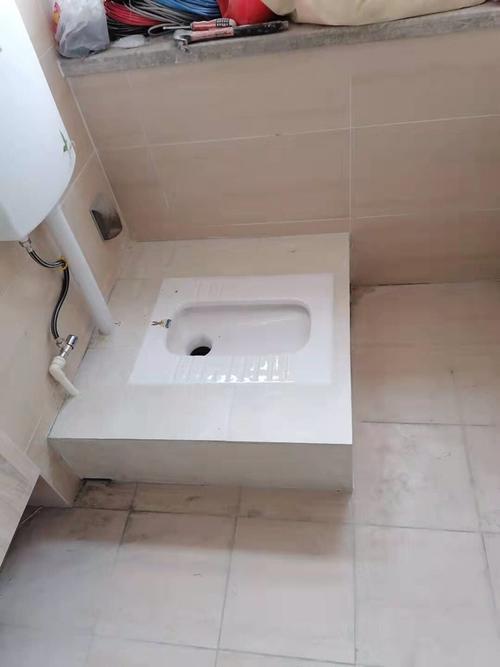 蹲便器前冲后排离墙要多远