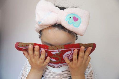 头热用热毛巾还是冷水
