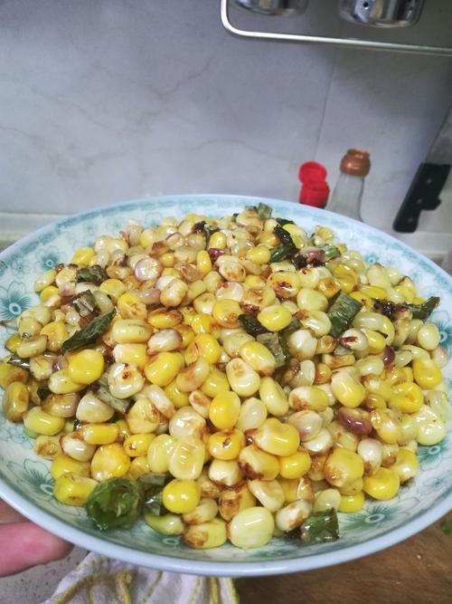 请我吃炒玉米什么意思