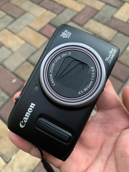 佳能sx240hs电池用万能充可以嘛