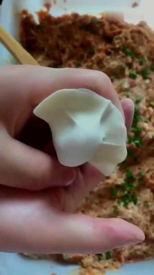 挤饺子手法