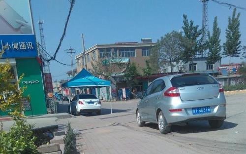 武强周窝镇在307国道以南吗