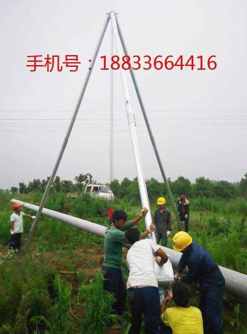 人工怎样立电线杆子